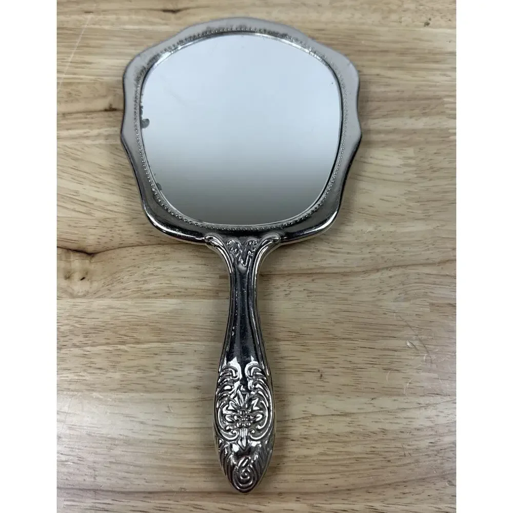 VINTAGE SILVERPLATE VICTORIAN STYLE VANITY HAND HELD MIRROR RAISED FLORAL DESIGN